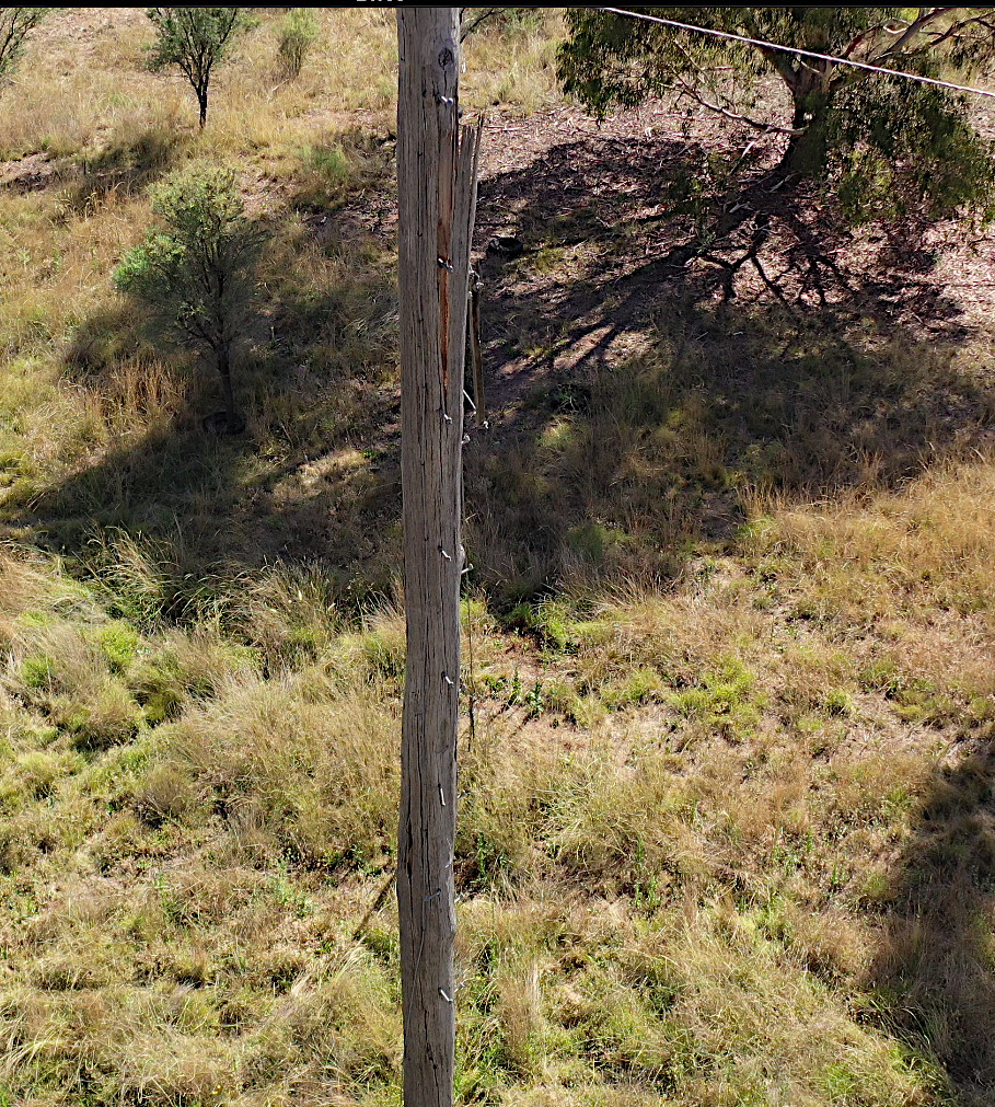 Failing high voltage power pole -possible fire risk if it falls